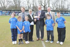 President John Hawkins presents a cheque for £750